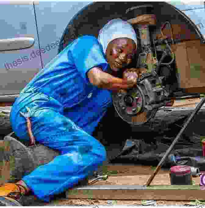 A Nigerian Mechanic Working On A Car Engine NIGERIAN MECHANIC LANGUAGE IFAANU Ifaanu