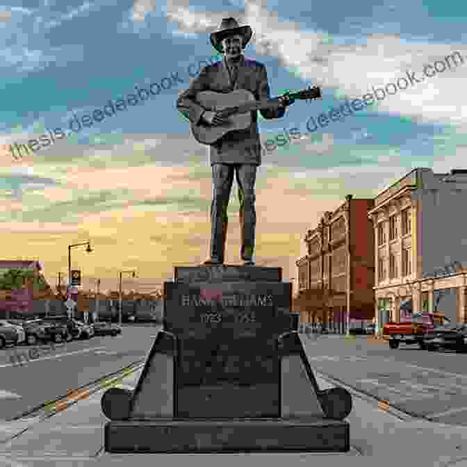 A Statue Of Hank Williams, Standing Tall And Playing His Guitar Hank: The Short Life And Long Country Road Of Hank Williams