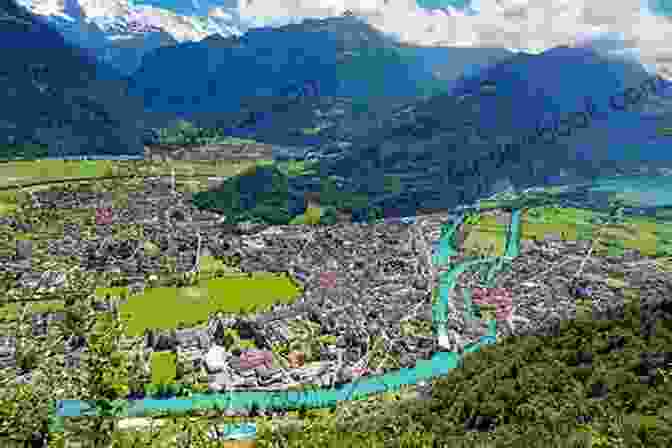 A View Of Interlaken, Switzerland, A Picturesque Town Surrounded By Towering Mountains And Crystal Clear Lakes. Adventures In The Swiss Alps: Geneva Zermatt Zurich Lucerne St Moritz Beyond
