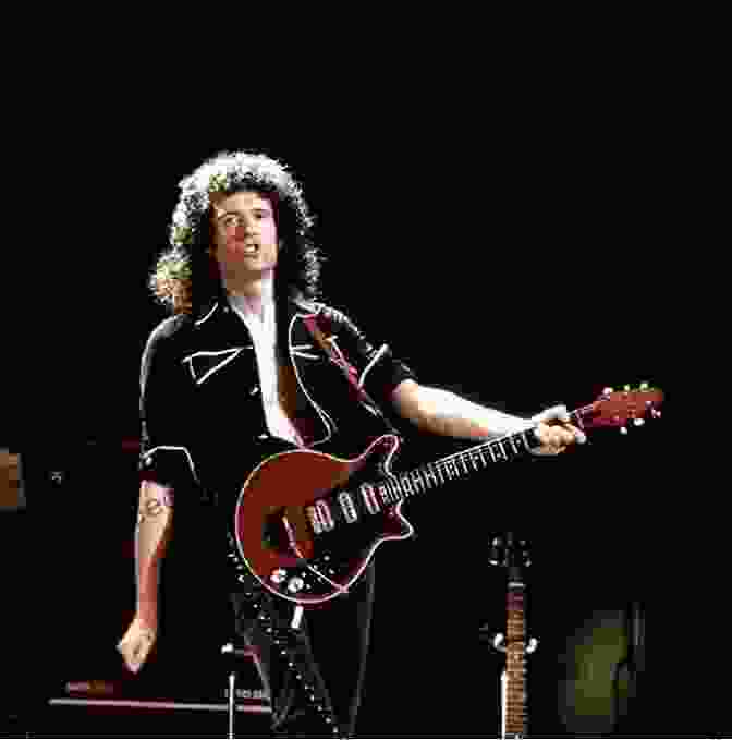 Brian May, The Virtuoso Guitarist Of Queen, Performing With His Signature Red Special Guitar. Long Live Queen: Rock Royalty Discuss Freddie Brian John Roger