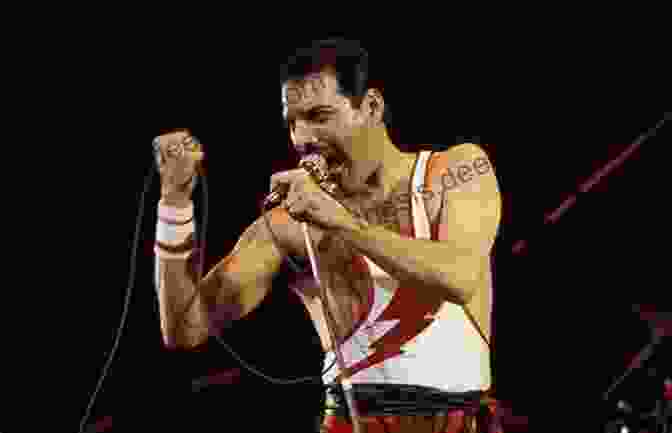 Freddie Mercury, The Charismatic Frontman Of Queen, Performing On Stage. Long Live Queen: Rock Royalty Discuss Freddie Brian John Roger