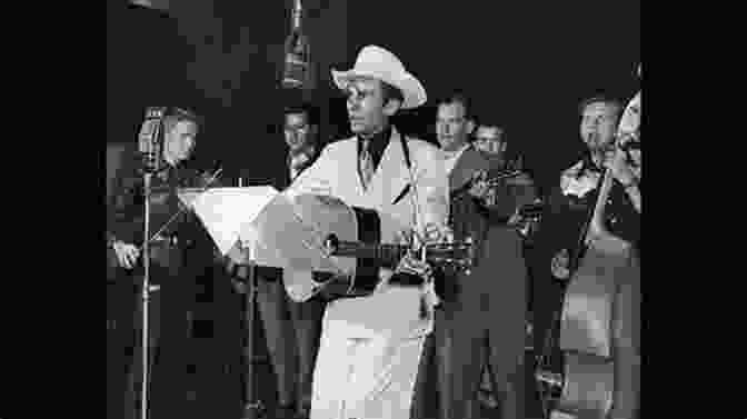Hank Williams Performing In His Early Career, Wearing A Cowboy Hat And Strumming A Guitar Hank: The Short Life And Long Country Road Of Hank Williams