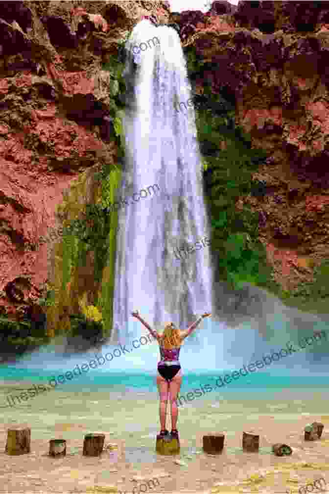 Hiker At The Base Of Havasu Falls In The Grand Canyon GoOutWest Com Southwest USA Travel Guide